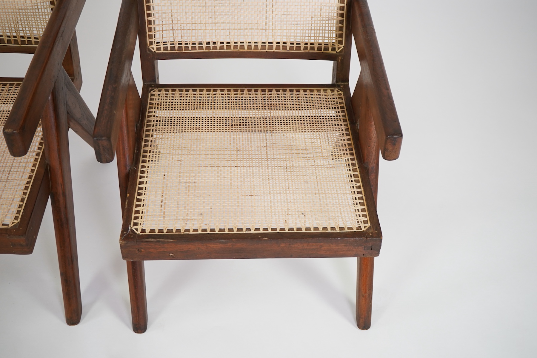 Pierre Jeanneret (Swiss, 1896-1967) for Chandigarh: A pair of cashew 'Easy' armchairs PJ-010105A